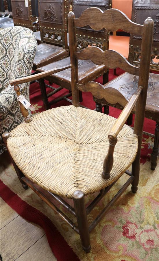 An early 19th century French ash ladder back chair